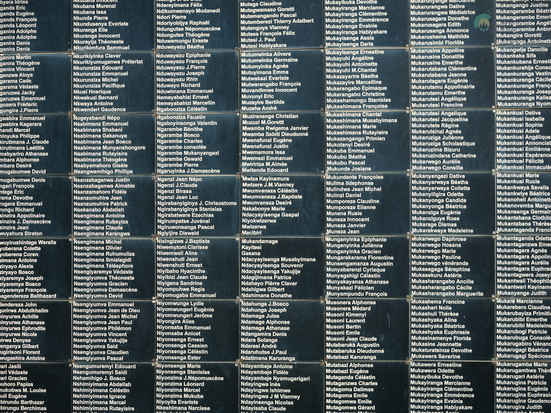 victims' names engraved on a black wall at the Kigali Genocide Memorial. the work is still in progress as many of the victims are still not identified.